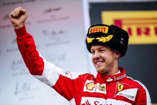 Nella foto, Sebastian Vettel festeggia il suo secondo posto sul podio del GP Russia 2015, indossando il curioso colbacco realizzato da Pirelli.